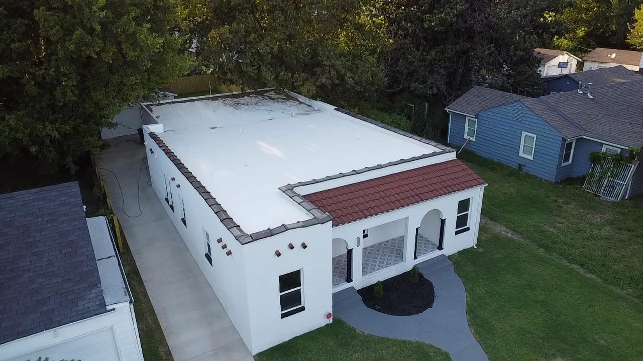 Commercial flat roof and tile installation