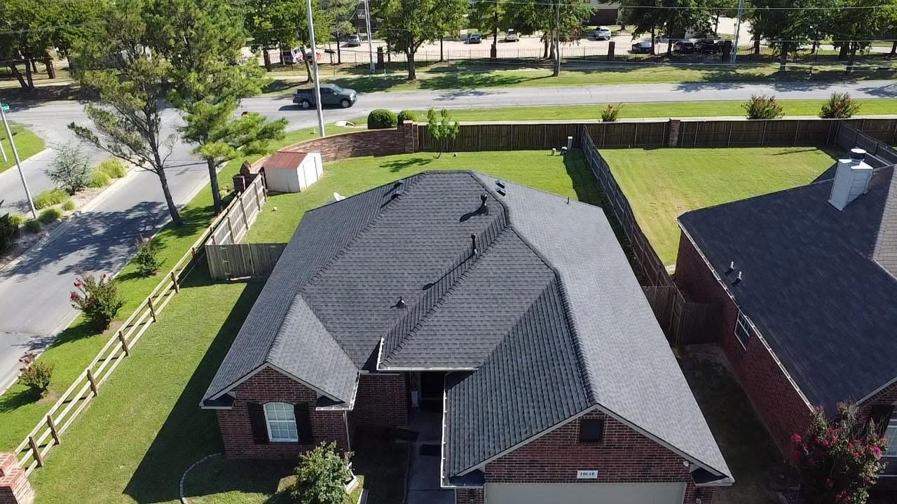 Brick home with new roof installation in Tulsa